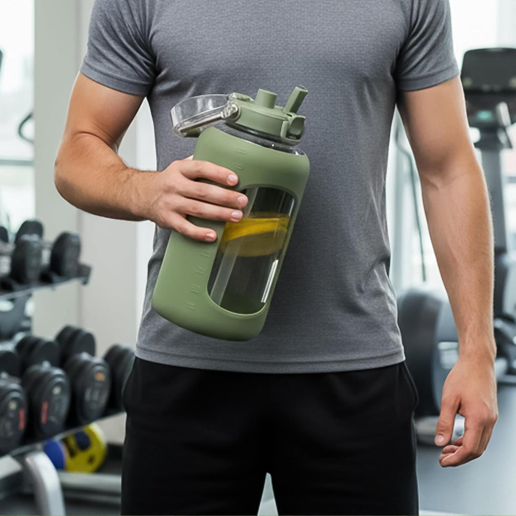 BLUEGO 84oz Glass Water Bottles with Sturdy Stainless Steel Handle, Large Water Bottle with Straw Sip & Chug Lid, 2.5L Water Jug Silicone Sleeve with Time, Daily Travel Sports, Olive